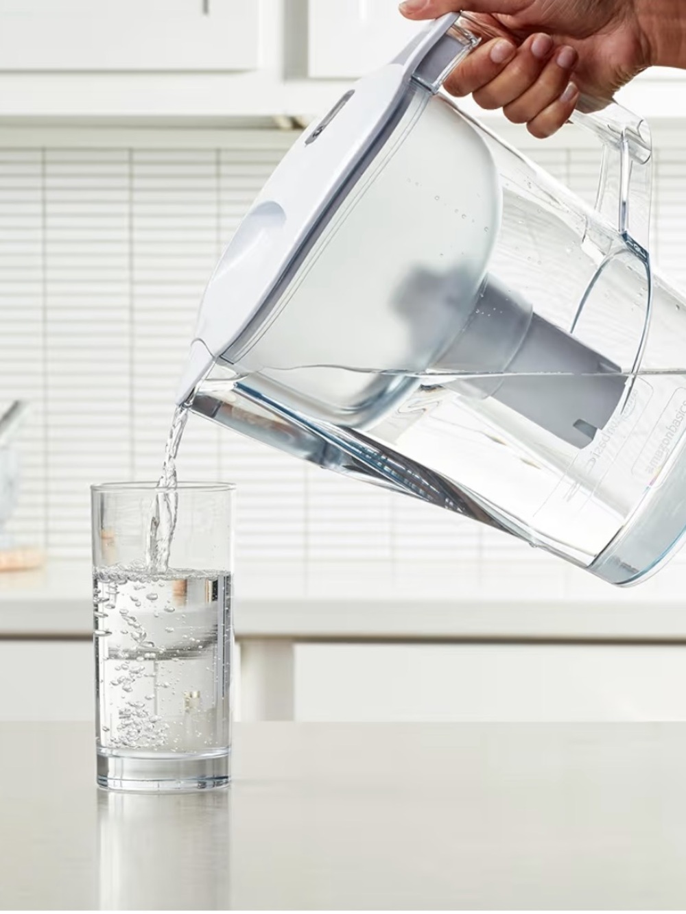 Amazon Basics 10-Cup Water Filter Pitcher Compatible with Brita Filters display